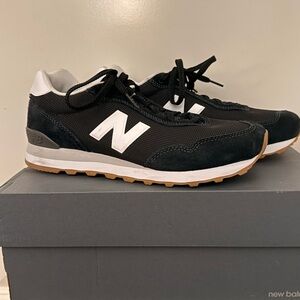 New Balance Men's Black and White Sneakers